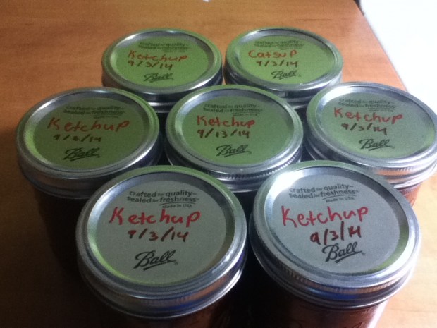 After 24 hours, recheck the seals then label and date the lids. Remember- you’re not done until the dates and labels are done.