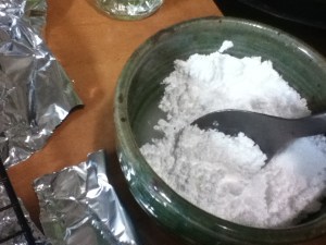Mix a little water into some powdered sugar. Add the water a little at a time, it doesn't take much.