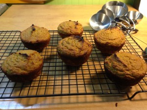 The oversized muffins took a few extra minutes, but they emerged from the oven looking quite lovely. Here they are cooling off and awaiting a taste test.