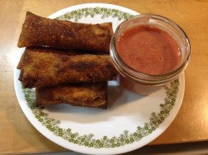 Here is the finished product, next to the cranberry dipping sauce. Definitely my favorite use of Thanksgiving left overs to date.